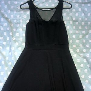 Sleeveless black skater dress with mesh